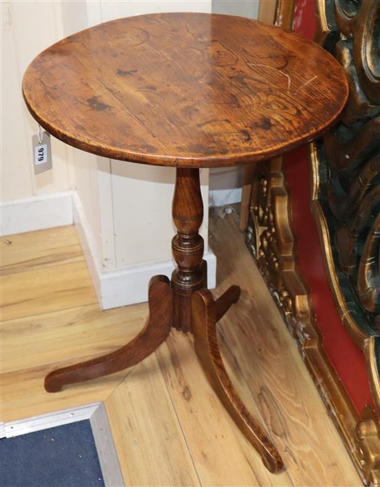 A 19th century provincial elm circular occasional table on tripod base Diameter 52cm